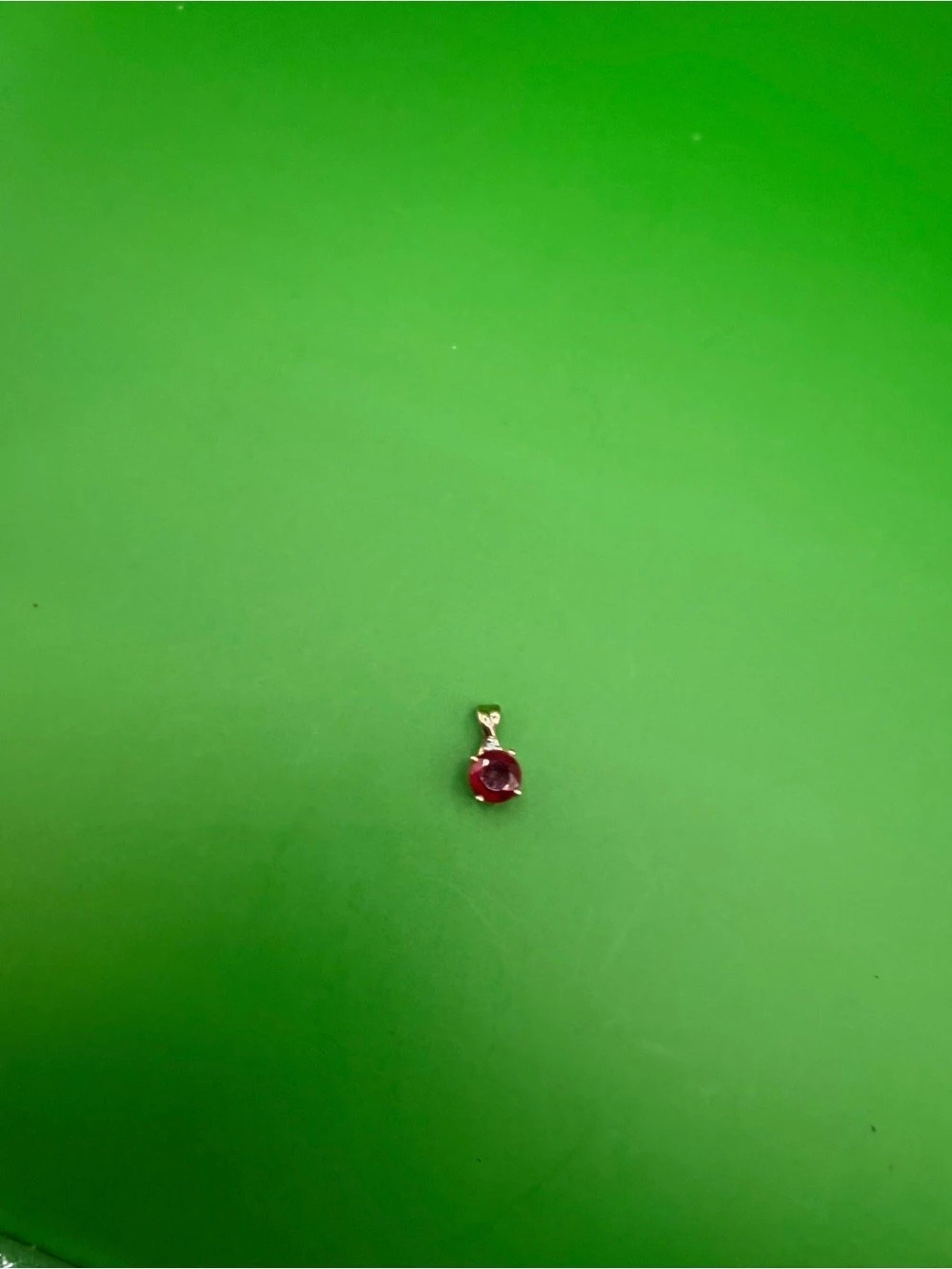 10k Yellow Gold .75 Ct Ruby & Small Diamond Pendant.